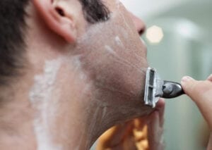  Male grooming concept of man shaving